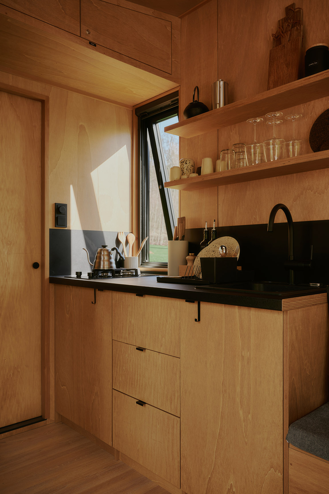 Kitchen area in a cabin of the German tiny house hospitality start-up Raus. Photo: Raus/Noel Richter