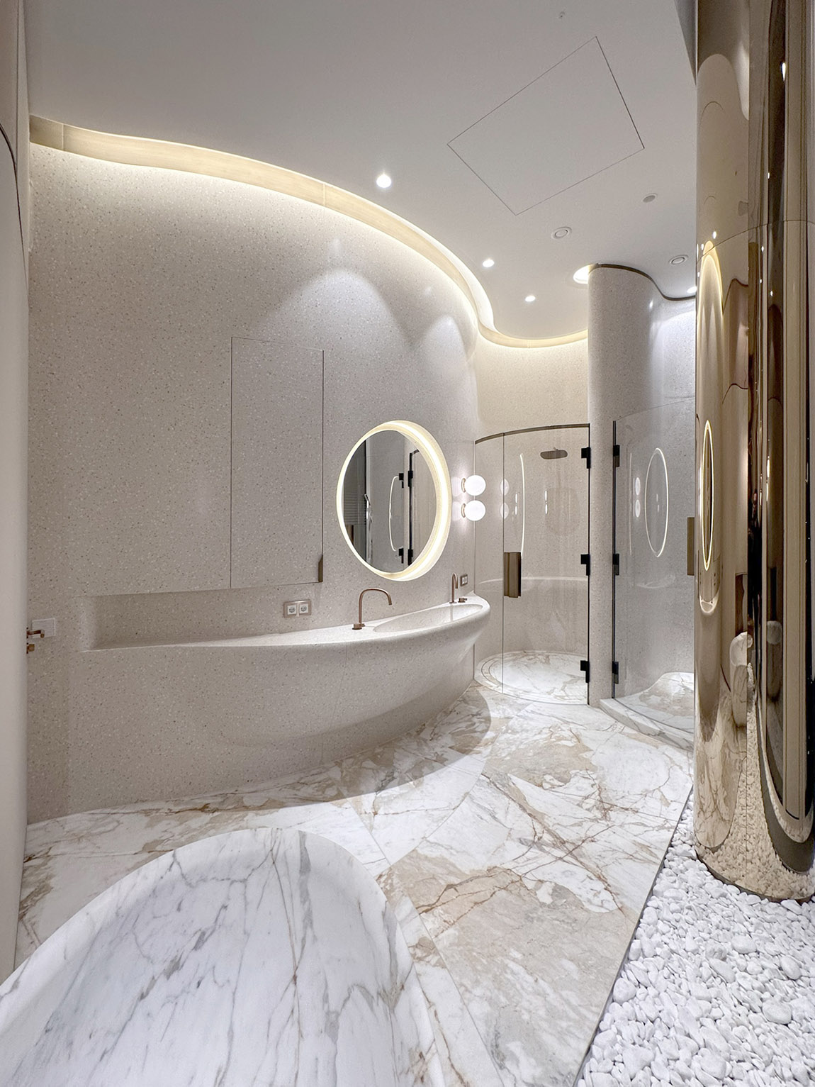 Material processing in perfection: curved marble in the guest bathroom. Photo: OOW we design architecture | OOW: Giving space to beauty