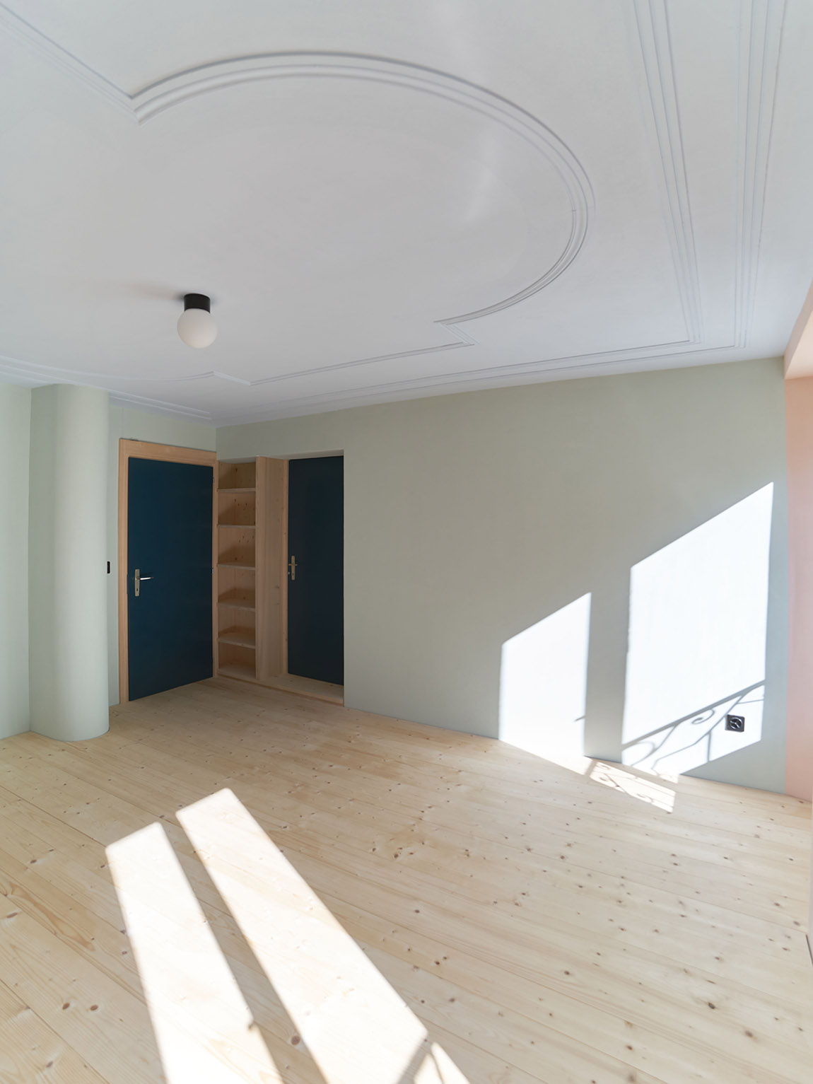 Colours, stucco, and wooden floorboards were restored. The 1970s doors were adjusted and painted. | STUDIO MHA – Reinterpreting the existing