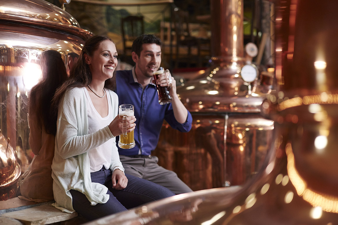 A couple in the Badisch Brauhaus Brewery. Photo: TMBW / Christoph Duepper | Raise a glass to tradition: Southwest Germany’s brewing heartland