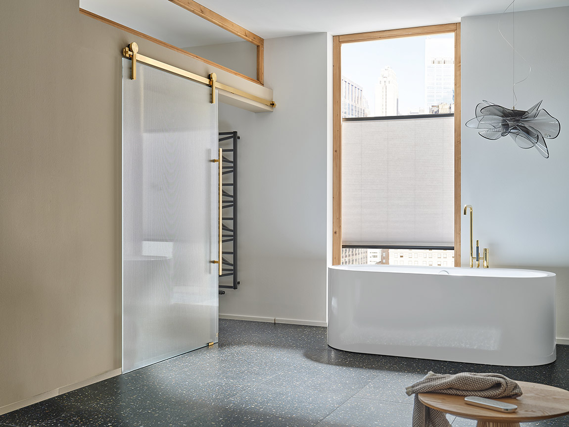 Opus sliding door system in polished gold finish | MWE Edelstahlmanufaktur: Passionate about quality
